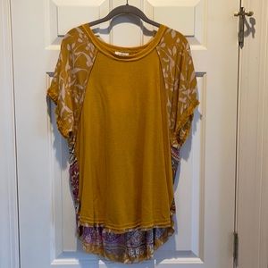 Umgee adorable top.  NWT never worn.  Size large